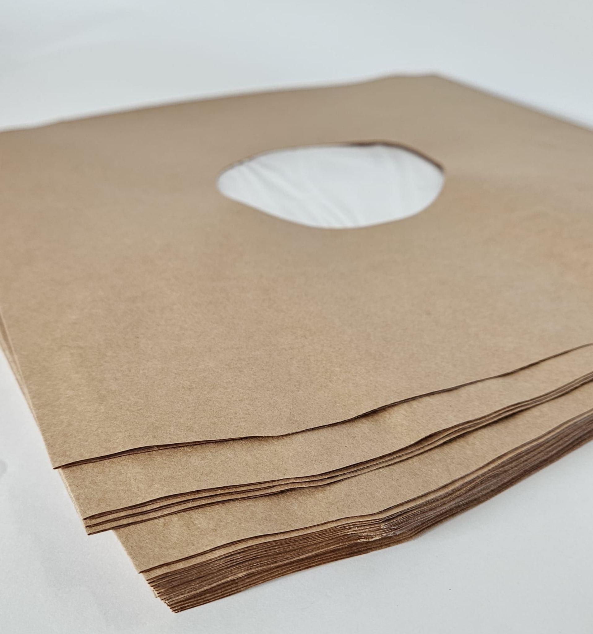 Pochettes intérieures papier kraft doublé antistatique, trou central, coins biseautés pour vinyle 33T x 25 - Etui