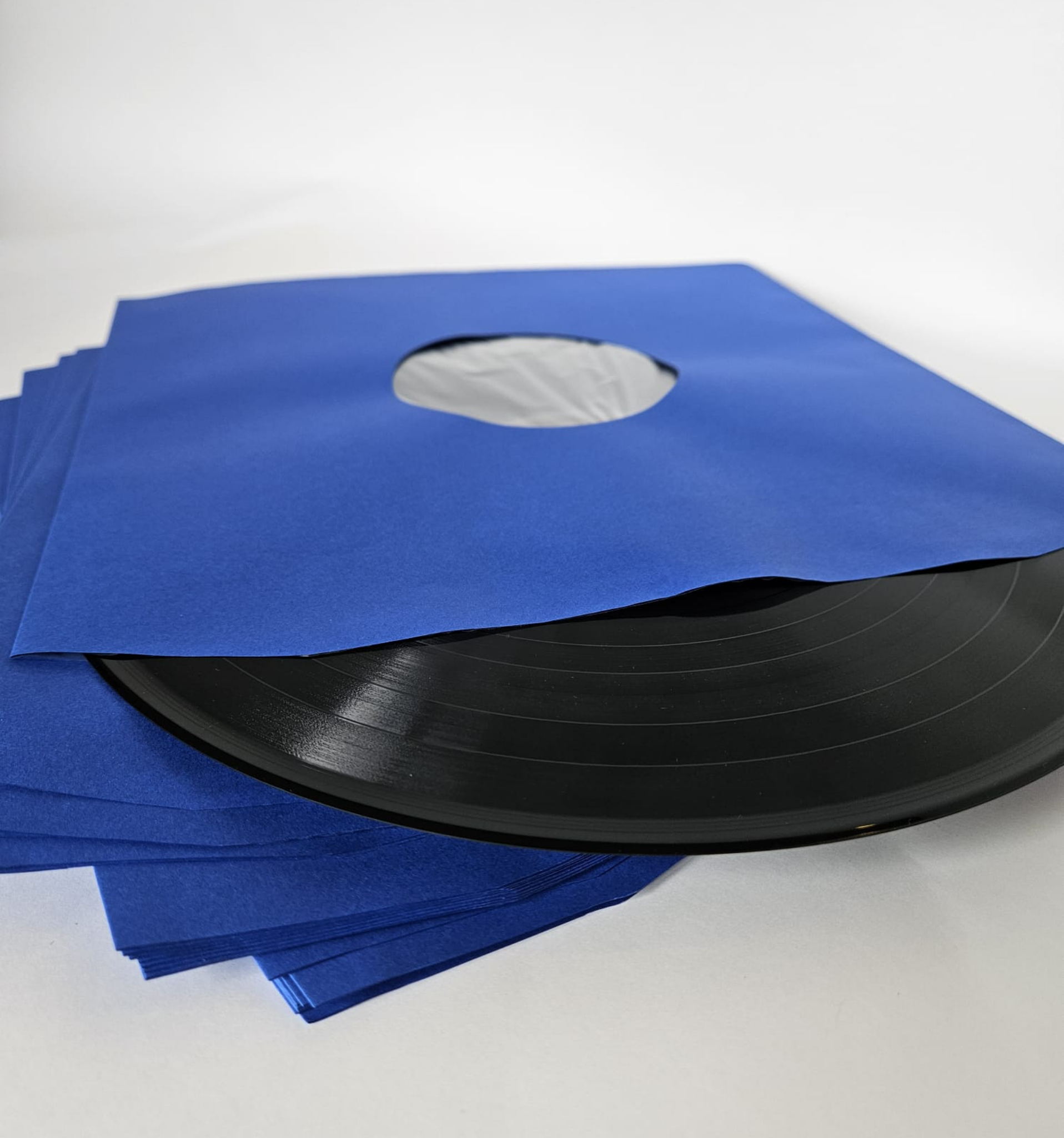 Pochettes intérieures papier doublé bleu antistatique , trou central, coins biseautés pour vinyle- 33T x 25 - Etui